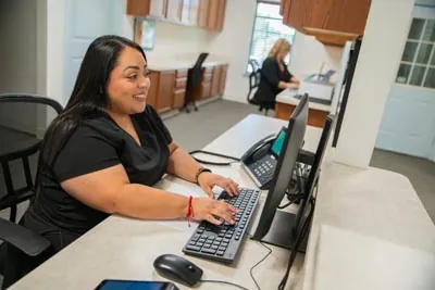 Brisa, patient coordinator at Sunnyvale Kids Pediatric Dentistry, helping to schedule a dental appointment
