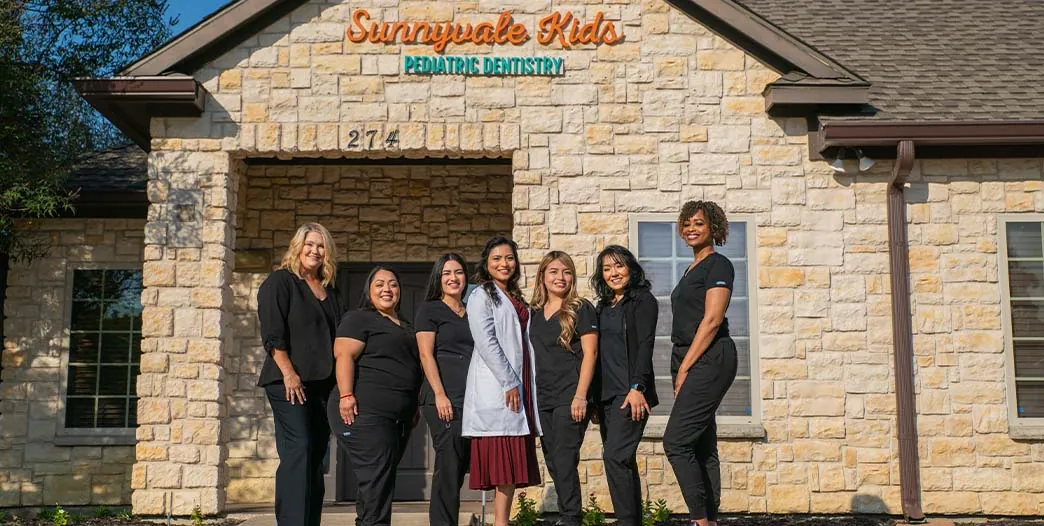 The Sunnyvale Kids Pediatric Dentistry standing outside their Sunnyvale, TX dental office